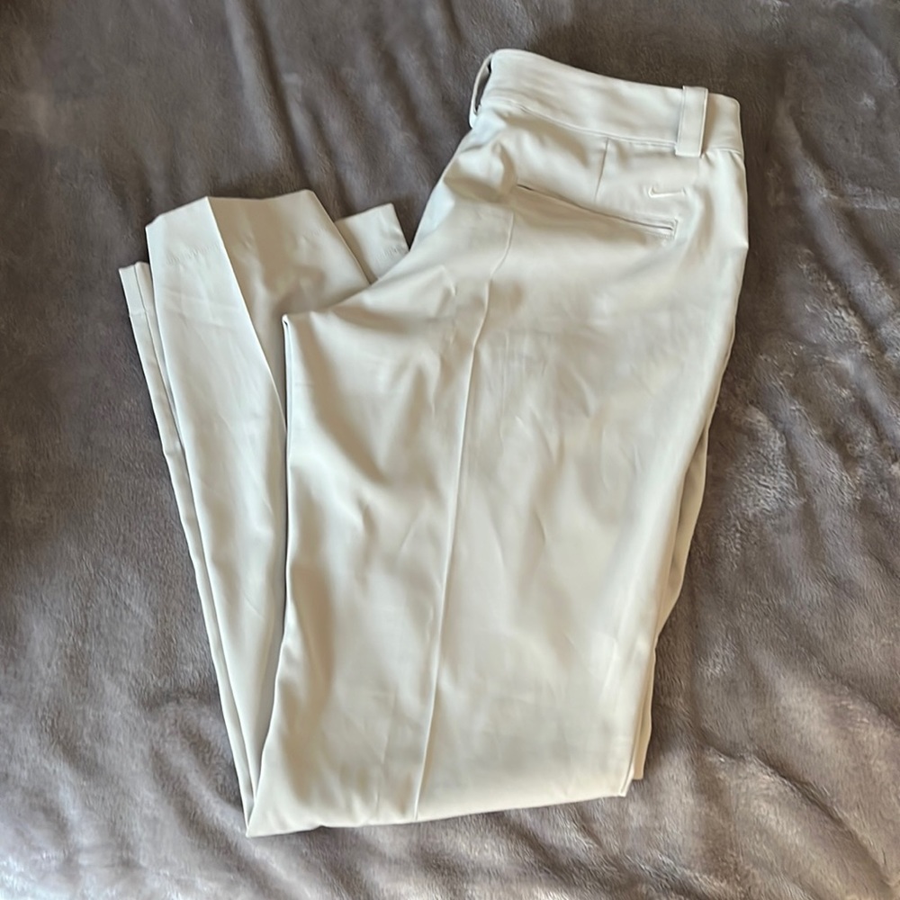 Nike women’s size 12 golf tour performance dry fit pants.